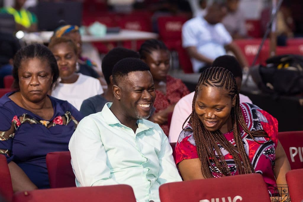 Families watching from the auditorium