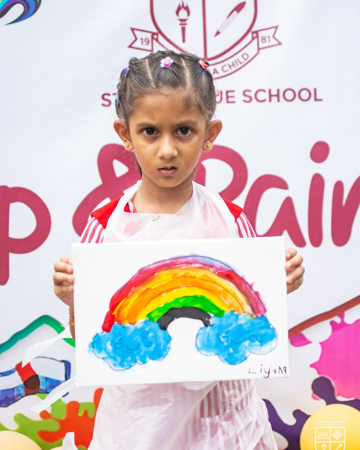 A finished rainbow, held up